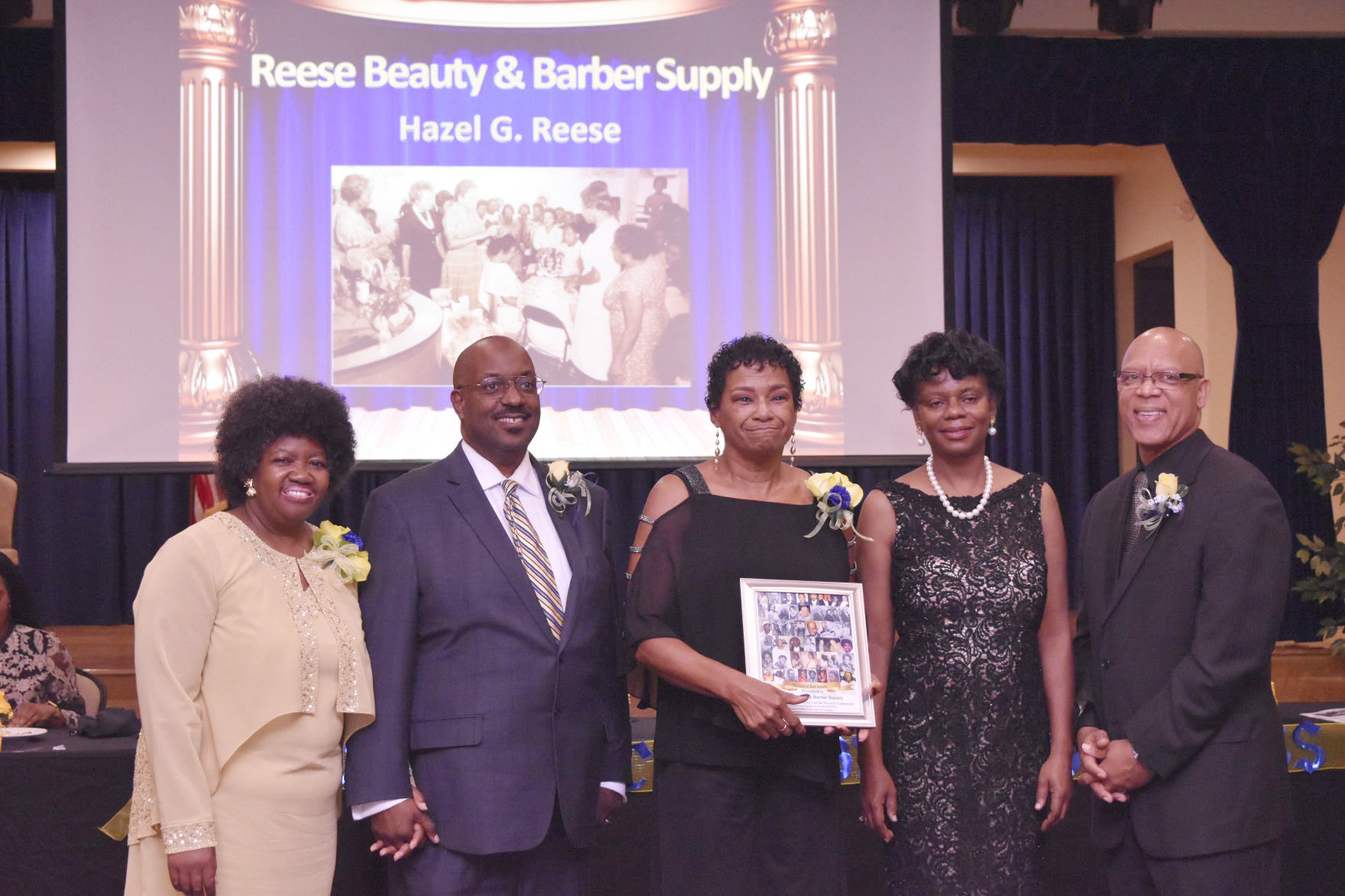 Bettye Leagones receives Legacy Award for Reese Beauty & Barber Supply.